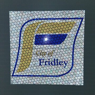 Custom high intensity prismatic reflective decal shown in low-light conditions to demonstrate enhanced nighttime visibility.